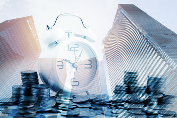 Double exposure of city and rows of coins for finance and banking concept,Business Finance and Money concept,Save money for prepare in the future.