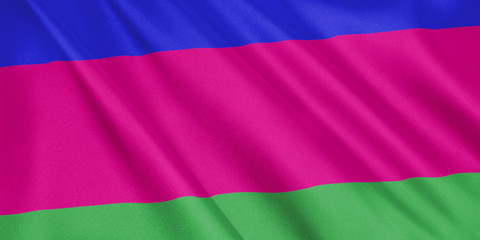 Fototapeta premium Kuban People's Republic flag waving with the wind, wide format, 3D illustration. 3D rendering.