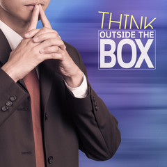 businessman thinking and think outside the box