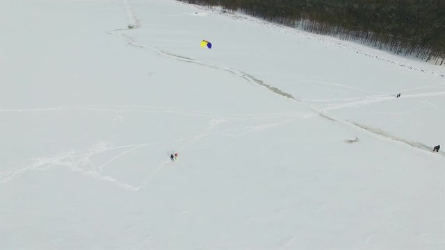 4K Aerial. Winter landscape  with snow kayt. Flight around