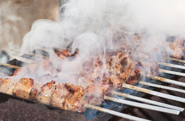 Skewered marinated raw meat, It is fried on charcoal