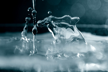 Water background / Water is a transparent, tasteless, odorless, and nearly colorless chemical substance that is the main constituent of Earth's streams, lakes, and oceans