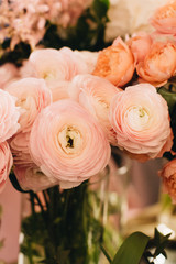 Beautiful spring bouquet with tender pink ranunculus flowers, elegant floral decoration