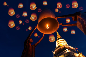Family - Thai people floating lamp in Yeepeng festival