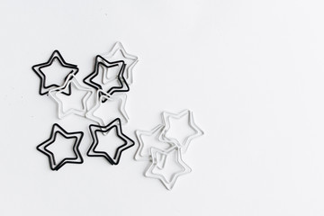 Black and white stars decorations on white background