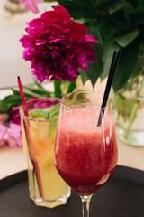 Delicious cocktail with grapefruit on wooden table