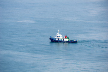 Tugboat is sailing in to the harbour.