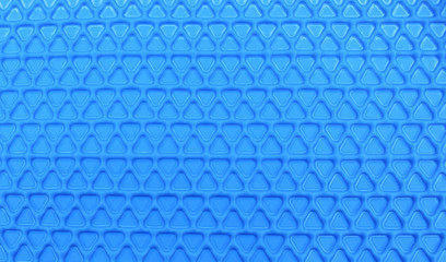 Blue rubber sheet is triangle pattern background.