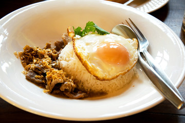 Fried Pork with Garlic Pepper and fried egg on Rice