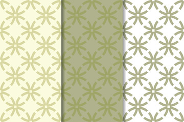 Olive green and white geometric ornaments. Set of seamless patterns
