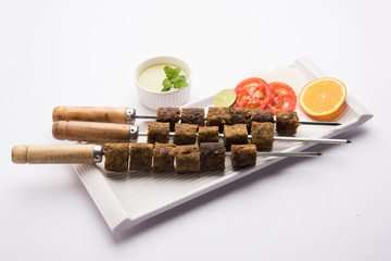Veg Seekh Kabab served with green salad and chutney