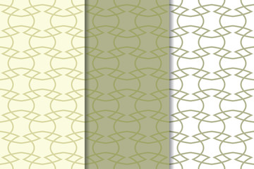 Set of geometric ornaments. Olive green and white seamless patterns