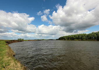 the beautiful landscape with low clouds over the river