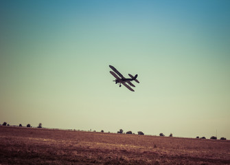 Fototapeta na wymiar Day of the Air Fleet. Biplane in the sky, in the air