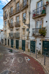 Fototapeta na wymiar Street of Lisbon, Portugal cityscape at the Alfama District.
