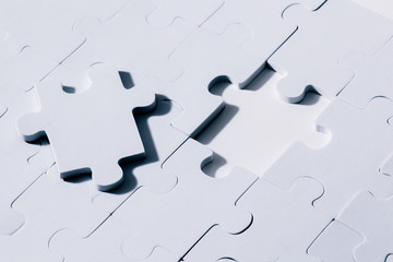 Empty and blank missing piece of jigsaw in white color background - business strategy and thinking...