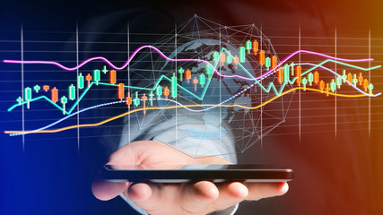Businessman usng a smartphone with a 3d render Stock exchange trading data information display on a futuristic interface