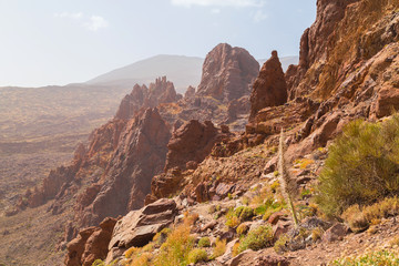 Fantastic martian landscape. Mars surface landscape with explorers in distance. View of the red terrestrial planet