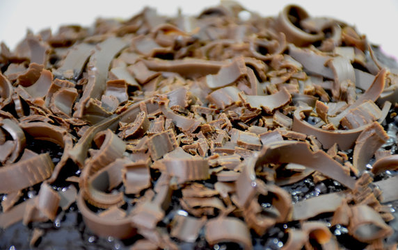 Dark chocolate flake on top ganache chocolate cake.