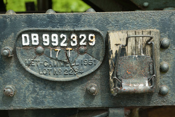 Broken number plate on railway wagon.