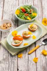 curcuma stuffed egg with mixed salad