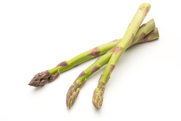 Fresh green asparagus on white background.