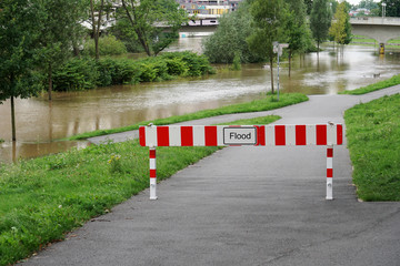 flood barrier, road blocked due to flooding