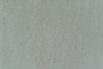 Wall fragment with scratches and cracks