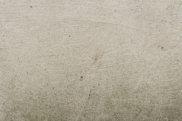 Wall fragment with scratches and cracks