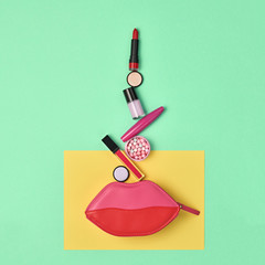 Fashion Cosmetic Makeup Minimal Set. Essentials. Trendy Design Pink Clutch Bag. Woman Beauty Accessories. Lipstick Mascara. Creative. Art Concept Style. Flat lay.