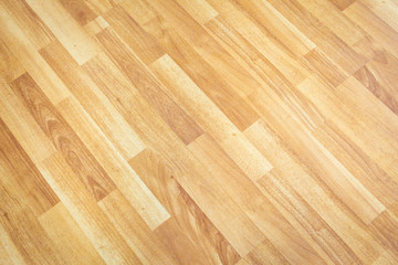Luxury laminate wood floor from top angle view showing the beautiful wood detail.