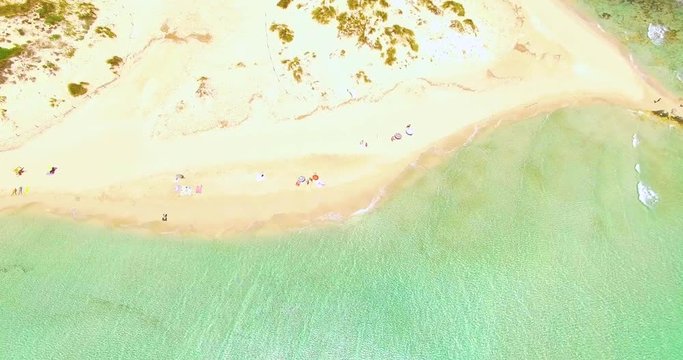 Aerial view of amazing, unspoiled and idyllic beach on a little island