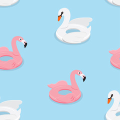 Inflatable animal rubber toys in swimming pool.