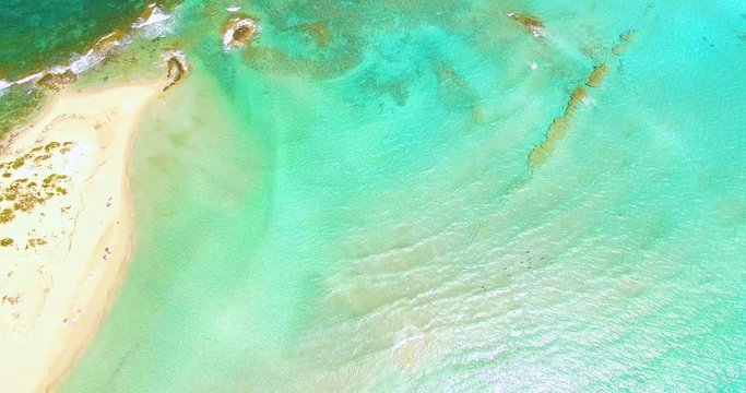 Aerial view of amazing, unspoiled and idyllic beach on a little island
