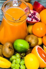 Fruit juice with tropical fruits, healthy juice with vitamin, refreshing drink for summer. Clean eating and healthy lifestyle concept.