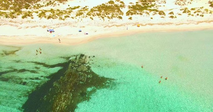 Aerial view of amazing, unspoiled and idyllic beach on a little island