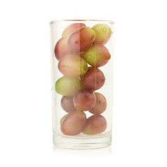 grapes red in glass isolated on white background