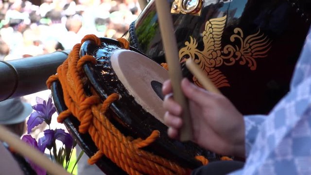 ASAKUSA, TOKYO,  JAPAN - MAY 20, 2018 : Close-up shot of beating Japanese drum at SANJA MATSURI (SANJA FESTIVAL).  In slow motion.