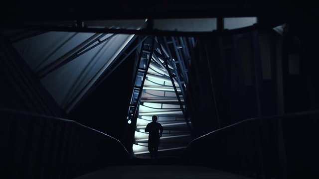 Silhouette Jogger on Dark City Bridge Slow Motion