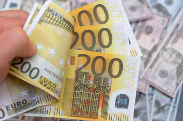 Denominations of dollars and euros in the composition.