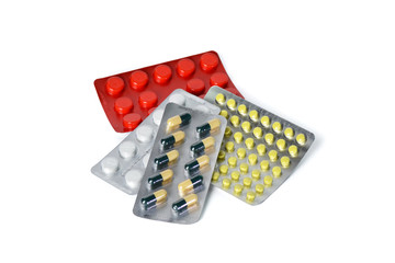 Tablets and capsules in blister packs. Medical preparation.