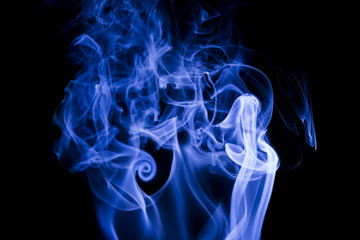 Fototapeta premium Blue smoke on black background