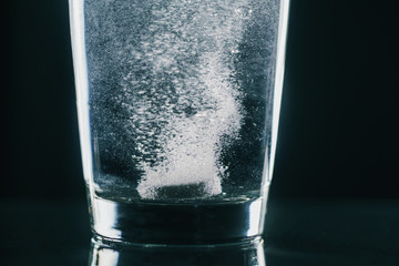 Tablet dissolving in water