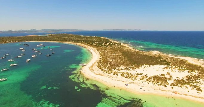 Aerial view of amazing, unspoiled and idyllic beach on a little island