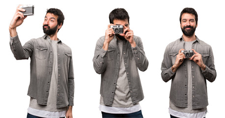 Set of Handsome man with beard photographing