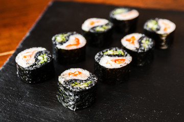 dishes of Japanese cuisine rolls with fish