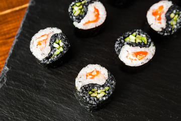 dishes of Japanese cuisine rolls with fish