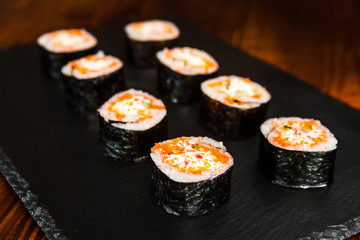 dishes of Japanese cuisine rolls with fish