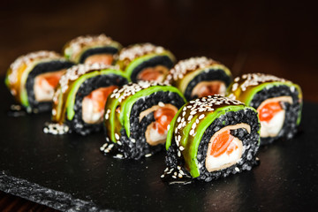 dishes of Japanese cuisine rolls with fish