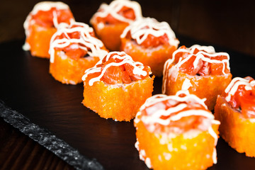 dishes of Japanese cuisine rolls with fish
